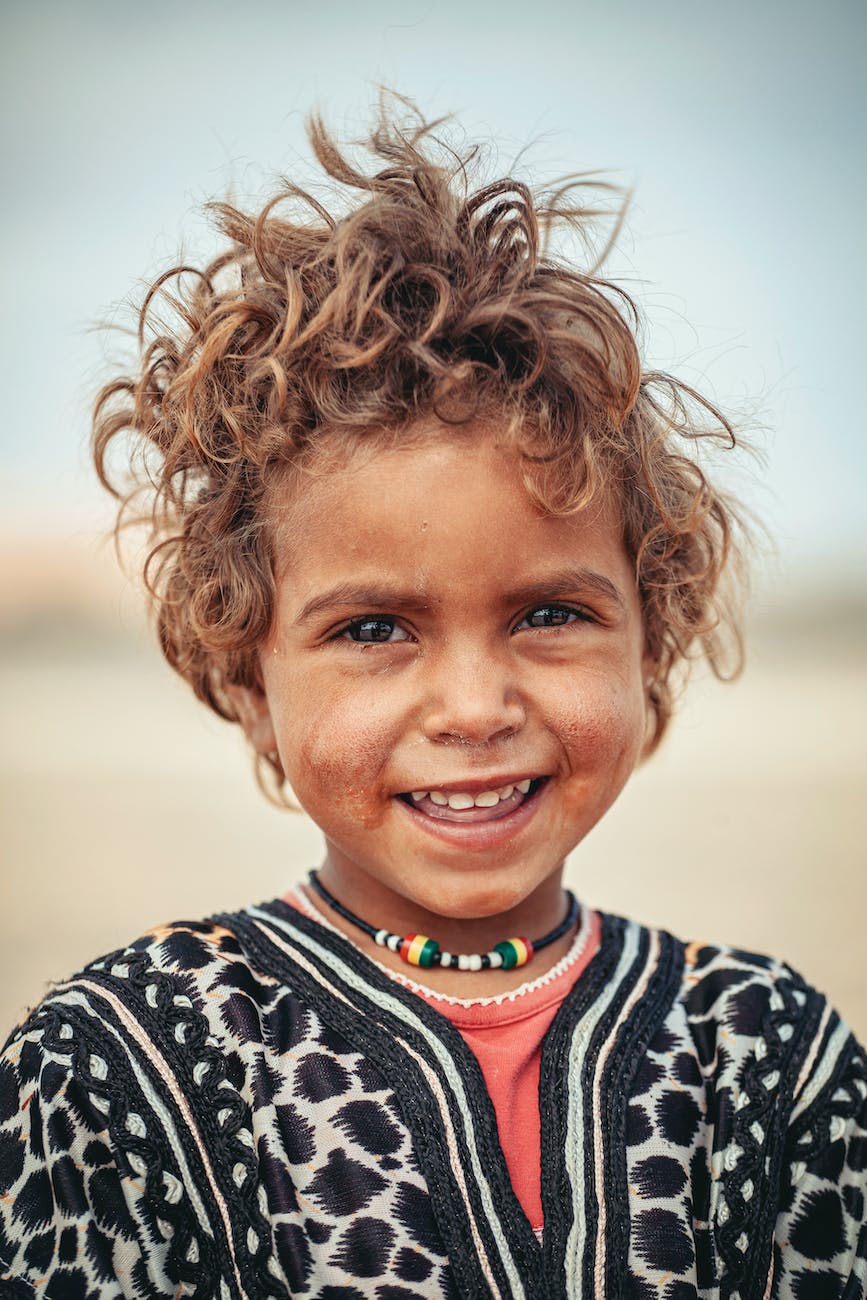 cute native australian child giving beautiful toothy smile