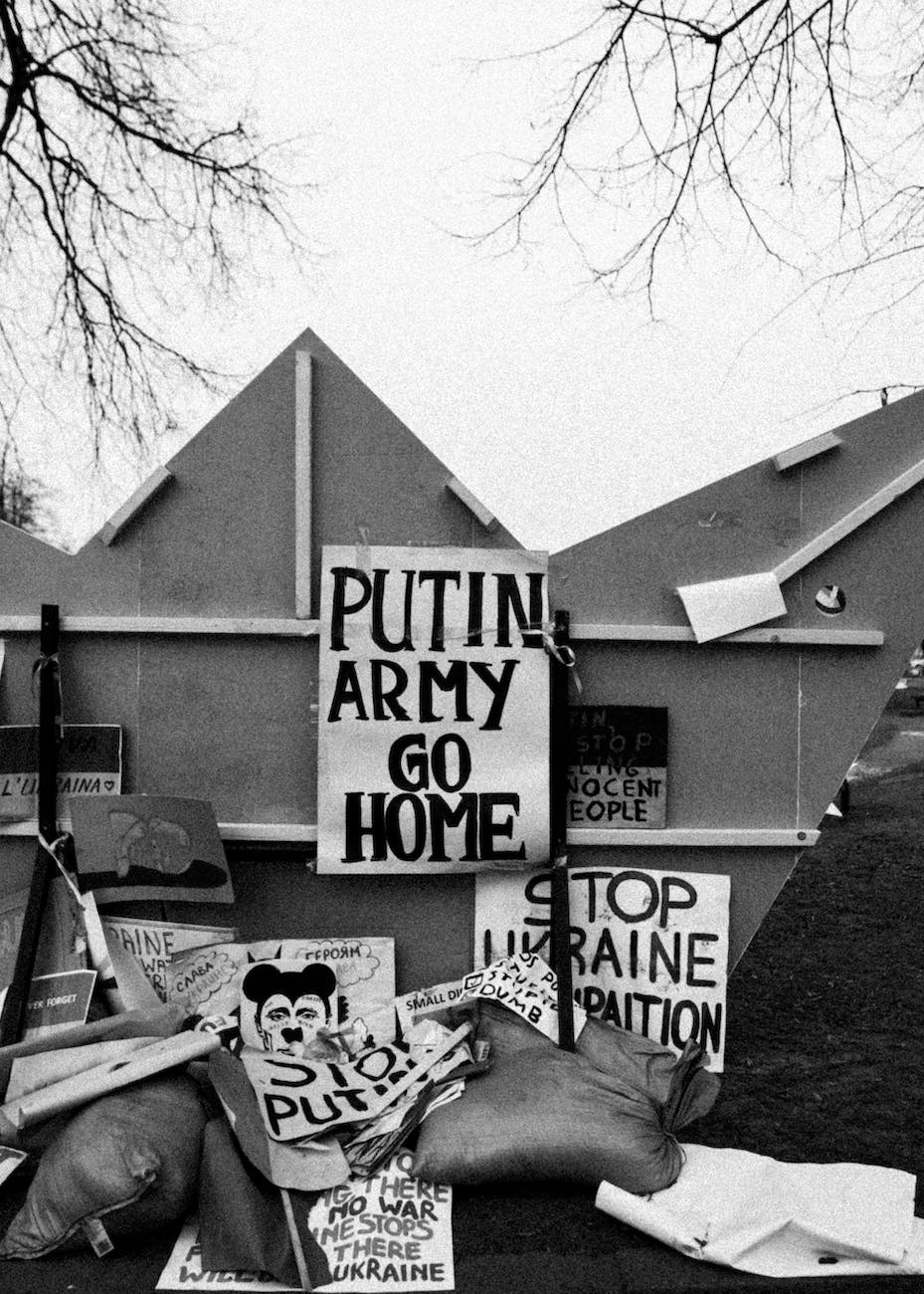 black and white photo of anti war banners