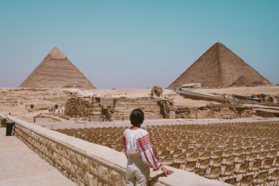 woman looking at pyramids