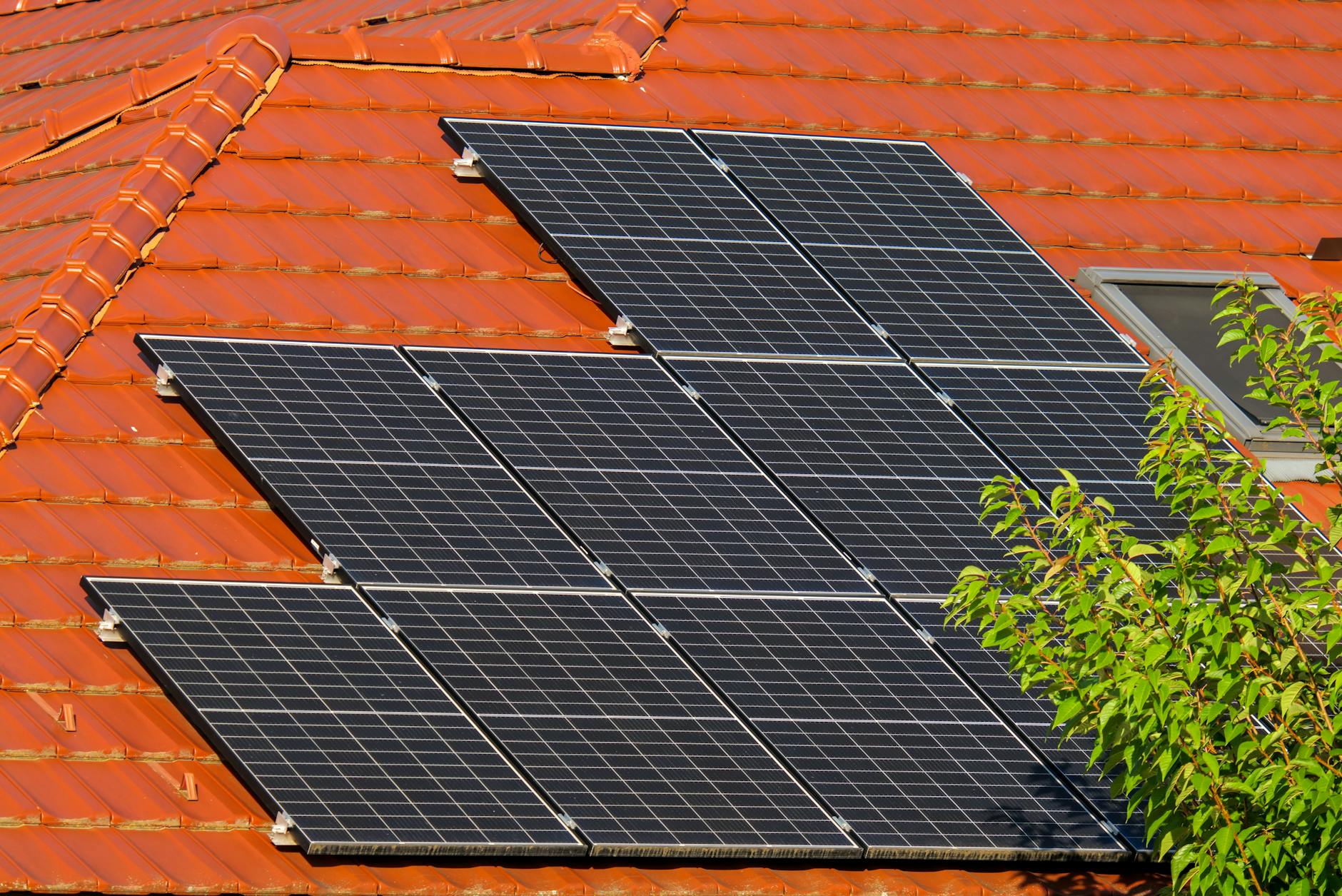 close up of solar panels on a roof of a house