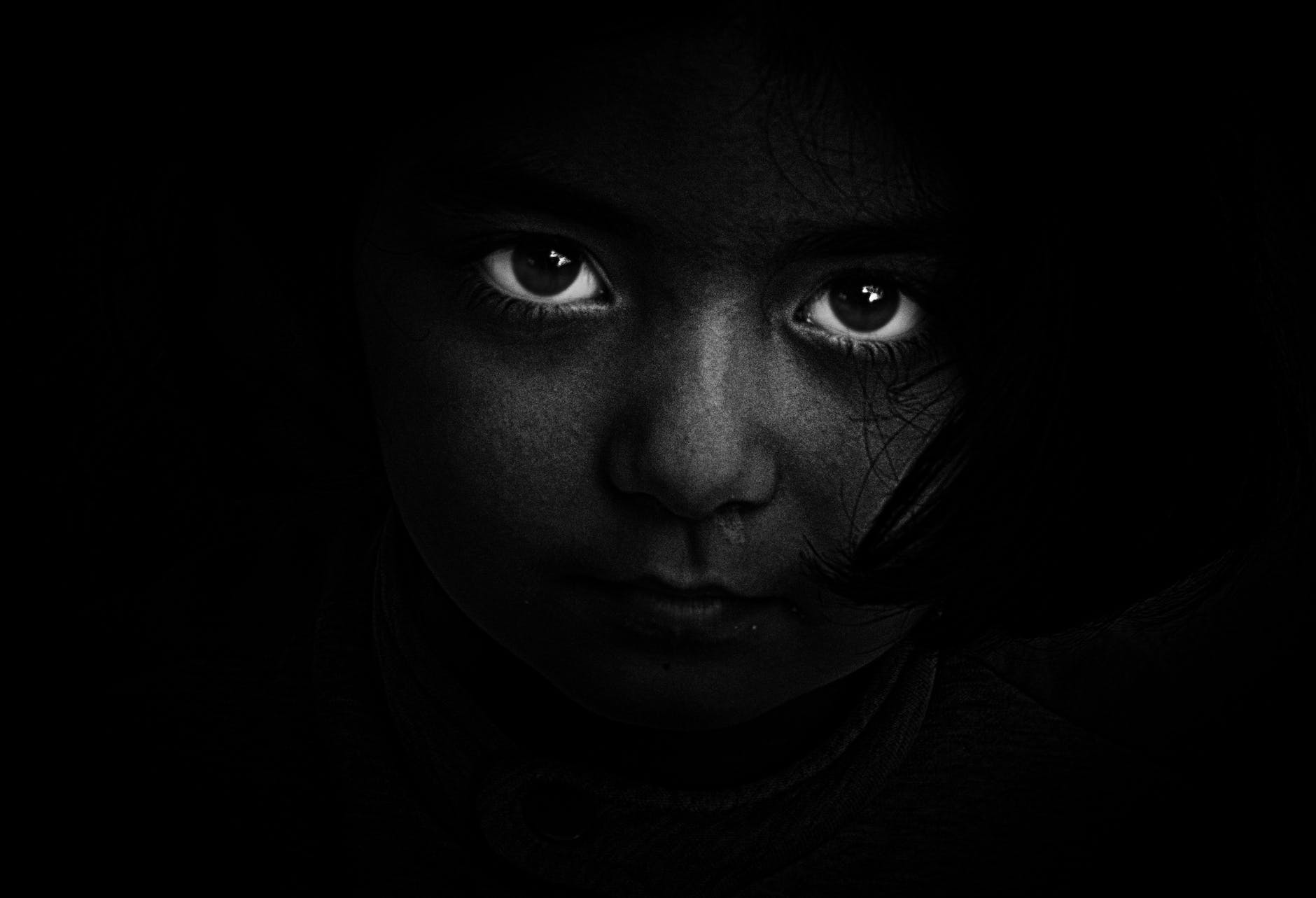 grayscale photography of girl s face