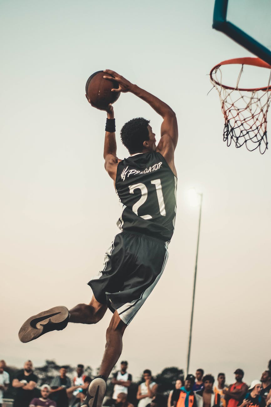photo of man doing dunk