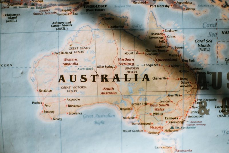 paper map of australia placed on wall